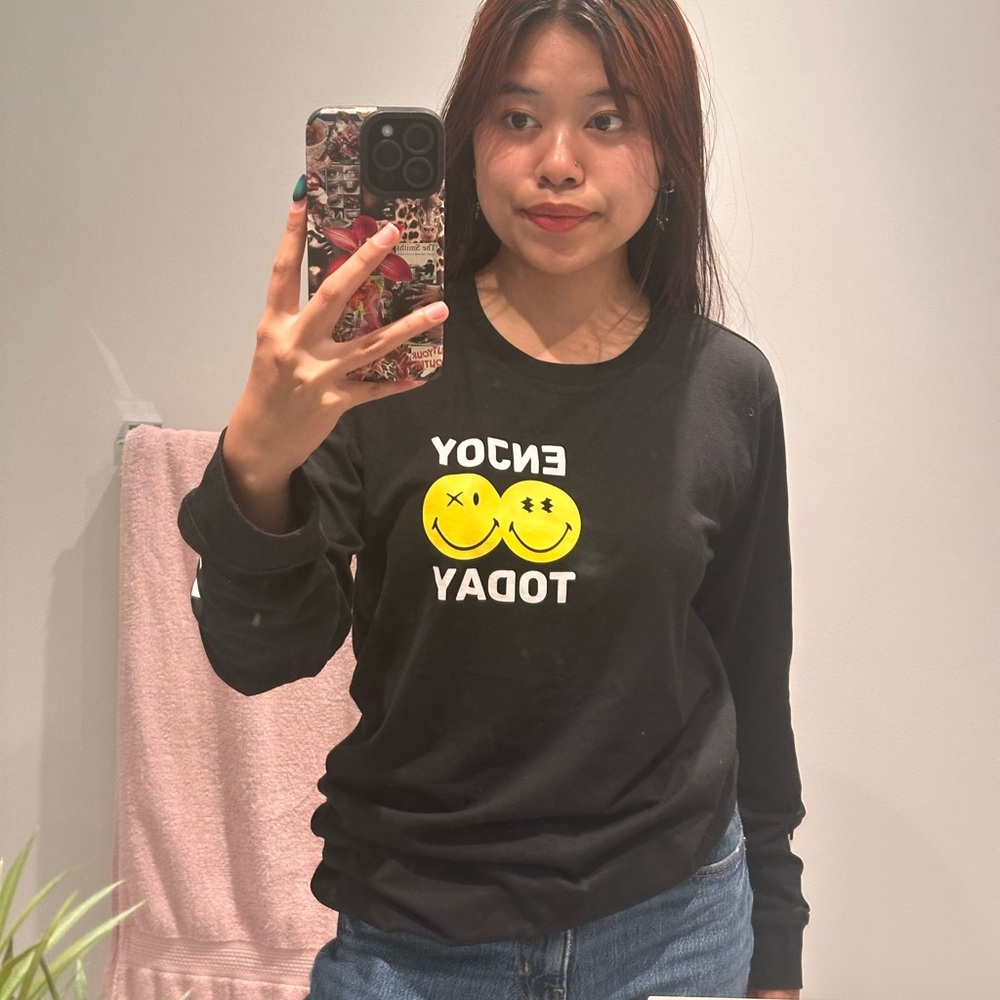 Black Sweatshirt with Yellow Smiley Graphic